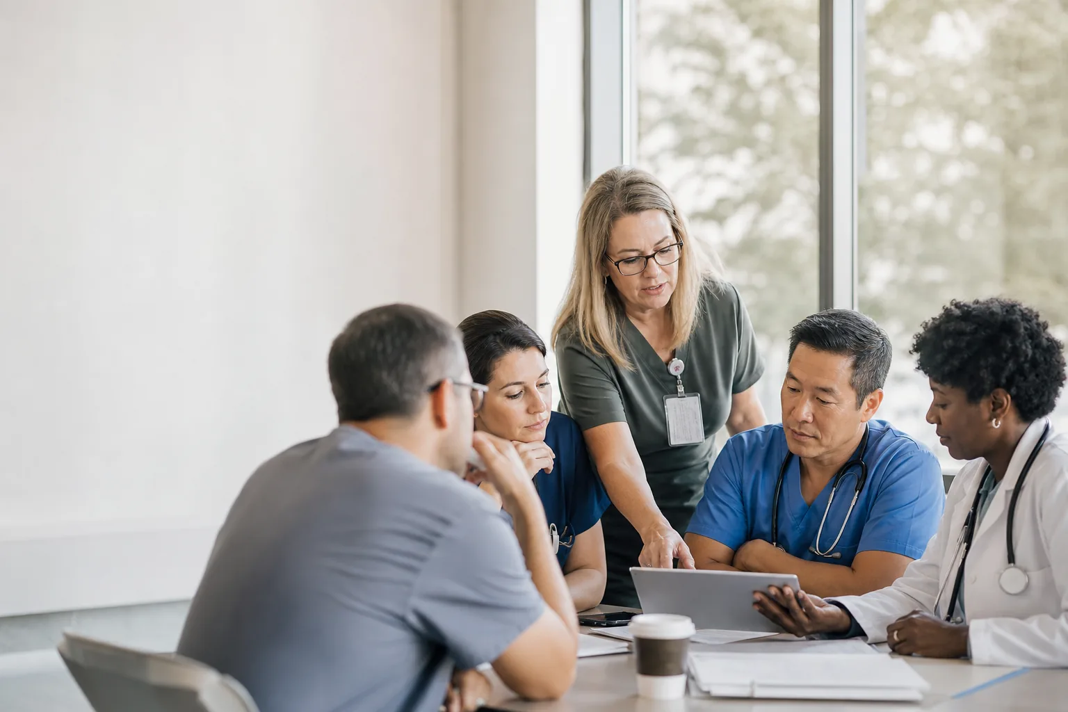 Clinicians collaborating on cross-border patient care